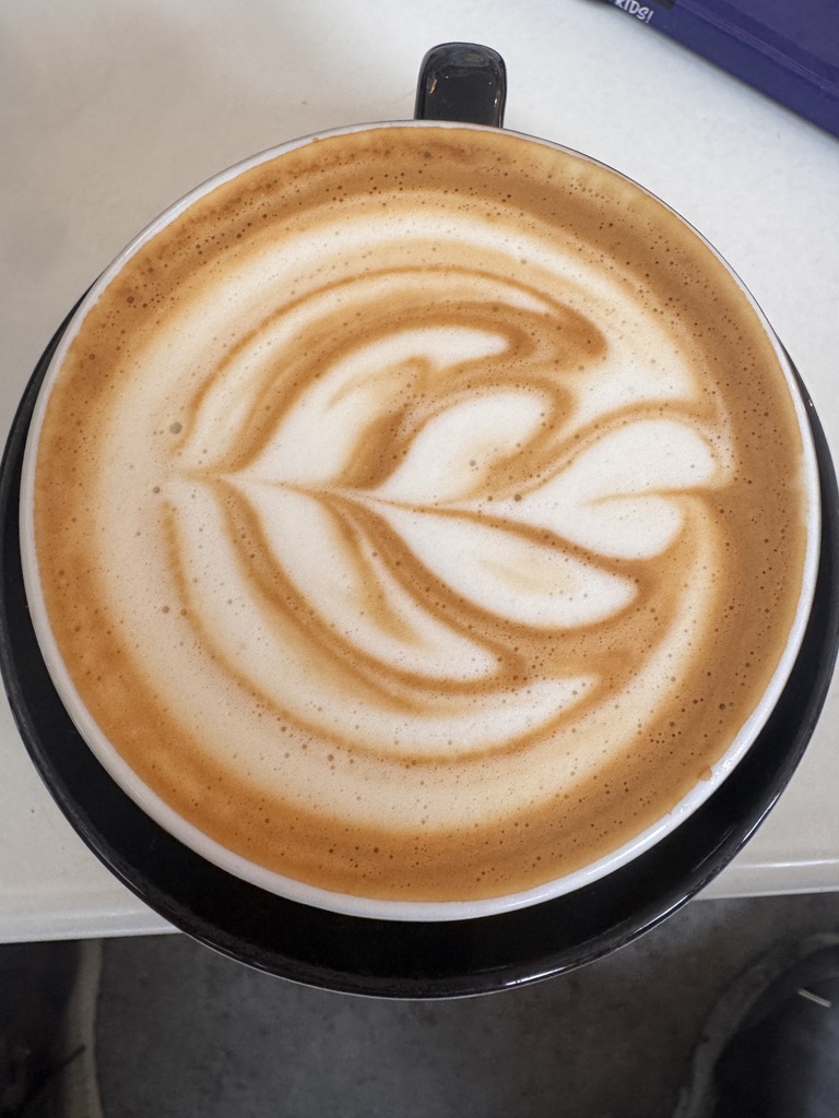 Flat white made with Lomond Market Yard coffee and hand-poured latte art