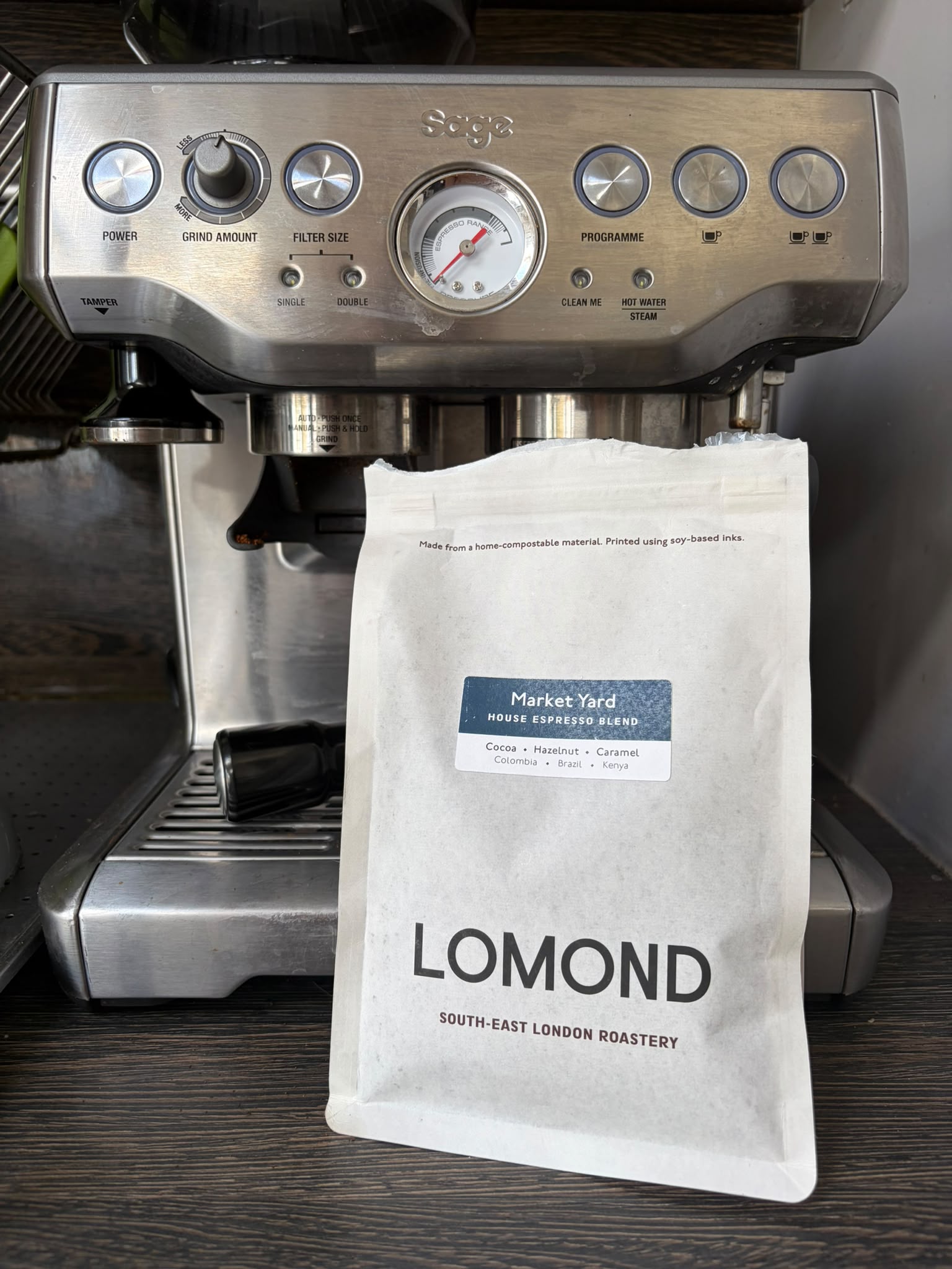 Lomond Coffee Market Yard bag photographed in front of the Sage espresso machine used for the Home Coffee Index trial