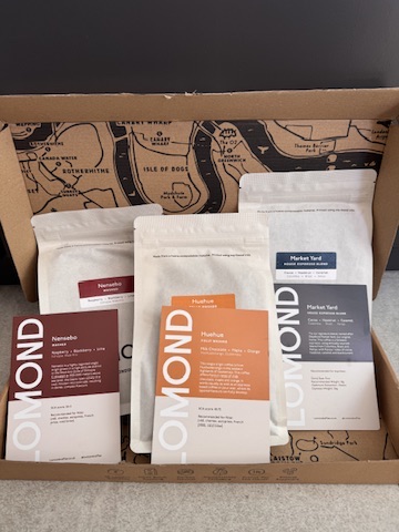 Open Lomond Coffee box containing Market Yard, Huehue and Nensebo bags