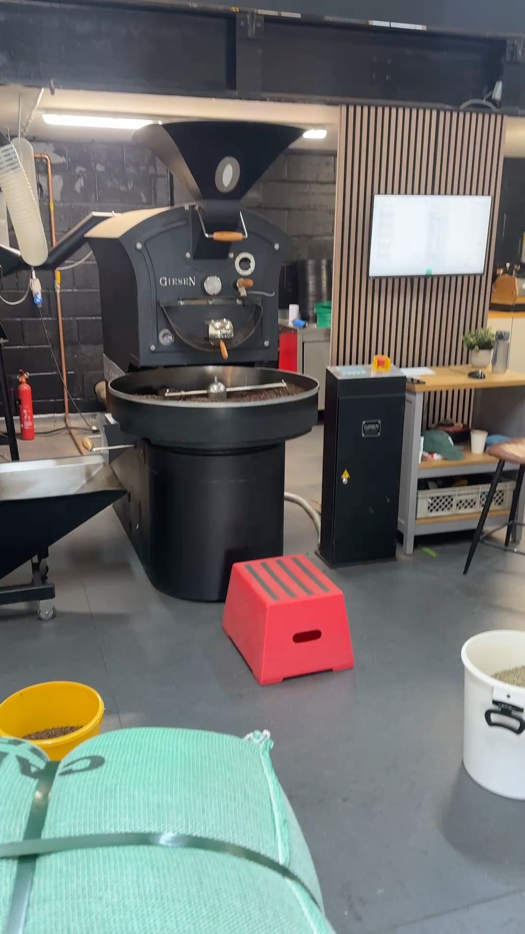 Giesen coffee roaster with freshly roasted beans cooling after a specialty roast